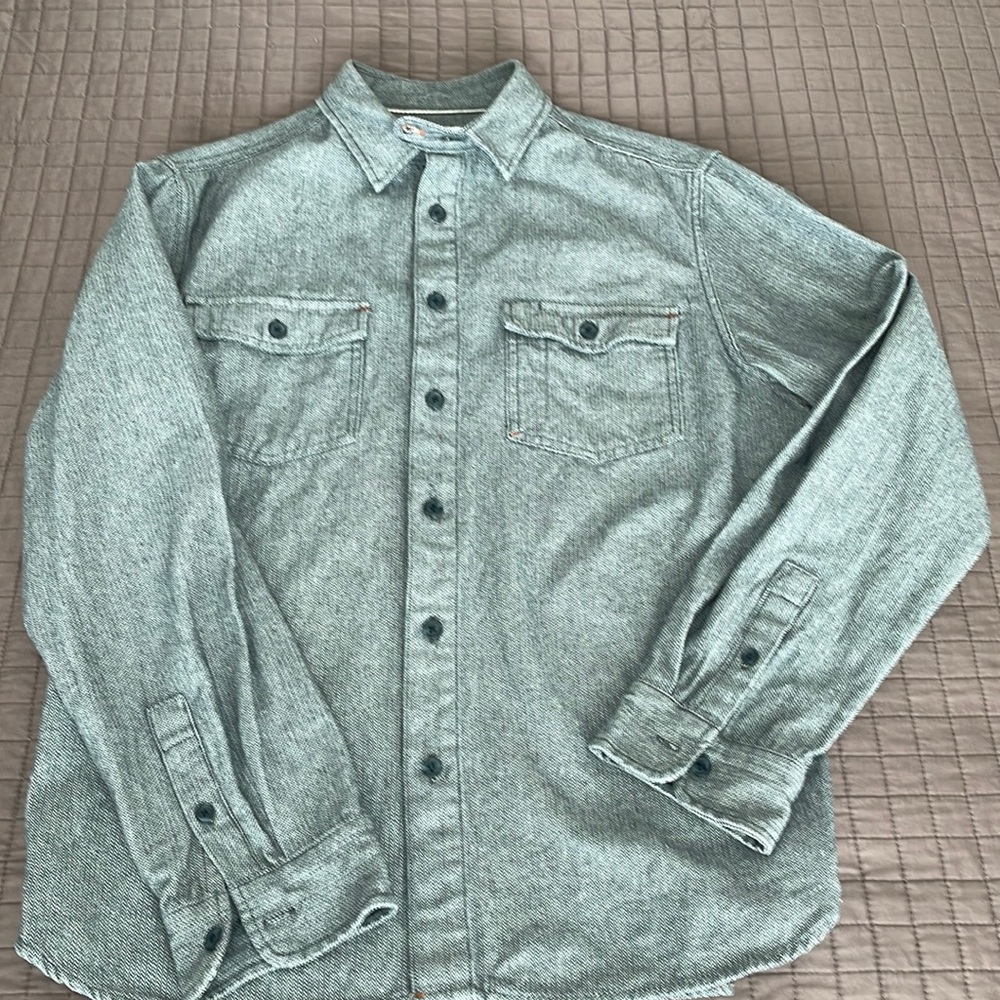 Shirts. 3 shirts like new. Each different in style.
